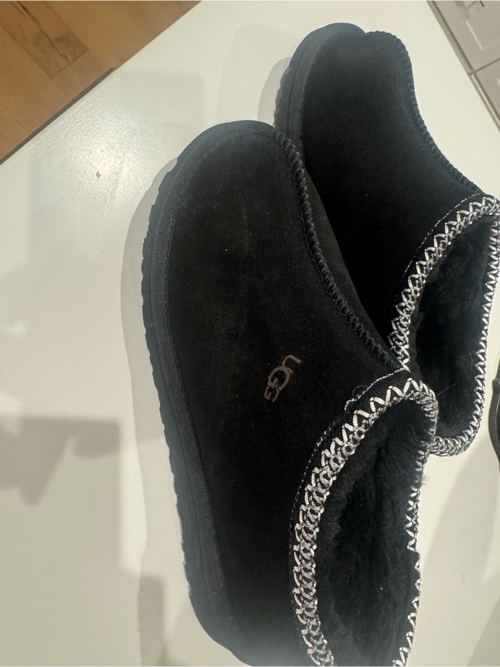 UGG Black Suede Slip-On Moccasin Slippers with Contrast Stitching